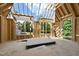The open frame shows the placement of windows for natural light and a look at the surrounding tree-filled landscape at 3601 Alamance Dr, Raleigh, NC 27609