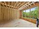The wood framing shows the placement of a picture window in this new home construction at 3601 Alamance Dr, Raleigh, NC 27609