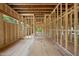 Unfinished interior showcases framed walls and open concept layout for customizable design at 3601 Alamance Dr, Raleigh, NC 27609