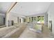 Expansive living room under construction showcasing an open layout and multiple glass doors at 3601 Alamance Dr, Raleigh, NC 27609