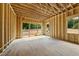 Partially constructed living room showcasing an open layout and natural light through the window at 3601 Alamance Dr, Raleigh, NC 27609