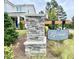 Attractive stone community entrance sign for 'The Grove at Neill's Pointe' neighborhood in a beautiful setting at 37 Steel Springs Ln # 3, Angier, NC 27501
