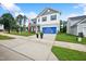 Charming two-story home featuring a manicured lawn and a welcoming facade in a desirable neighborhood at 4108 Shadbush St, Raleigh, NC 27616