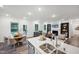 Bright and airy living space with a modern kitchen, dining area, and comfortable seating at 4108 Shadbush St, Raleigh, NC 27616