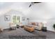Bonus room with neutral walls, gray carpet, ceiling fan, and cozy seating arrangement at 4622 Durham Rd, Wake Forest, NC 27587