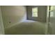 Bright bedroom featuring a large window to provide natural light under construction at 507 Olivia Crossing Ct # 20, Four Oaks, NC 27524