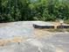 Poured foundation on a wooded lot, ready for new construction, providing a serene setting at 507 Olivia Crossing Ct # 20, Four Oaks, NC 27524