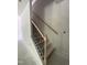 Modern staircase with a wooden handrail and black iron balusters under construction at 507 Olivia Crossing Ct # 20, Four Oaks, NC 27524