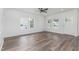 The living room is spacious and filled with natural light from the multiple windows at 620 Gilmer St, Burlington, NC 27217