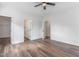 Spacious main bedroom with modern ceiling fan, en-suite bathroom, and walk-in closet at 620 Gilmer St, Burlington, NC 27217