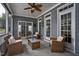 Comfortable back porch featuring seating and a ceiling fan, creating a perfect space for relaxing outdoors at 6489 Waters Edge Dr, Rocky Mount, NC 27803