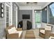 Cozy porch with comfortable wicker seating, an outdoor TV and a view of the backyard at 6489 Waters Edge Dr, Rocky Mount, NC 27803