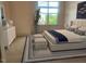 Cozy bedroom with natural light, decorative accents, and a comfortable bed at 700 Finsbury St # 304, Durham, NC 27703