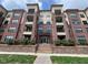 Attractive brick condominium building with multiple floors and balcony access at 700 Finsbury St # 304, Durham, NC 27703