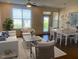 Bright and airy living room featuring hardwood floors, natural light, and modern decor at 700 Finsbury St # 304, Durham, NC 27703