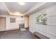Modern apartment lobby with neutral walls, elevator access, and sleek gray bench seating at 700 Finsbury St # 304, Durham, NC 27703