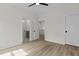 Bright bedroom with an open door to the bathroom at 80 Carnation Rd, Youngsville, NC 27596