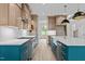 Gorgeous kitchen with a spacious island, stainless steel appliances, and ample storage at 80 Carnation Rd, Youngsville, NC 27596