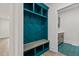 Chic mudroom features custom built-ins and a storage bench at 80 Carnation Rd, Youngsville, NC 27596