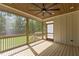 Relaxing screened porch with a natural wood ceiling and backyard views at 80 Carnation Rd, Youngsville, NC 27596