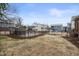Spacious backyard with a shed and black metal fence, great for outdoor activities at 917 S Blount St, Raleigh, NC 27601