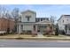 Charming two-story home with a covered front porch and professionally landscaped front yard at 917 S Blount St, Raleigh, NC 27601