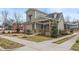 Charming two-story house with covered porch, manicured landscaping, and inviting curb appeal at 917 S Blount St, Raleigh, NC 27601