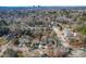 Aerial view of the neighborhood featuring a skyline and dense tree coverage at 1211 N Guthrie Ave, Durham, NC 27703