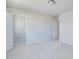 A bedroom features plush neutral carpeting and a large closet space, perfect for storage at 1236 Maple Branch Cir, Graham, NC 27253