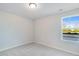 Simple bedroom with natural lighting and a neutral color palette at 1236 Maple Branch Cir, Graham, NC 27253