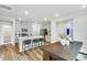 Open floor plan featuring a kitchen with stainless steel appliances and dining area at 1236 Maple Branch Cir, Graham, NC 27253