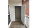 Relax on this outdoor balcony that leads to a storage unit at 1647 Kenmore Dr, Clayton, NC 27520