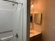 Bathroom featuring a walk-in shower, vanity, and mirror at 1647 Kenmore Dr, Clayton, NC 27520