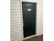 Apartment 1647 front door with black paint and white trim at 1647 Kenmore Dr, Clayton, NC 27520