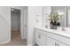 Well-lit bathroom with double vanity, modern fixtures, and ample counter space at 1748 Post Oak Dr, Haw River, NC 27258