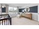 Bedroom features changing table, comfy chair and bright natural light from large window at 1748 Post Oak Dr, Haw River, NC 27258