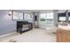 Stylishly decorated Bedroom featuring a black crib and a large window with natural light at 1748 Post Oak Dr, Haw River, NC 27258