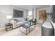 Inviting living room with stylish sofa, contemporary art, and a serene ambiance at 1748 Post Oak Dr, Haw River, NC 27258