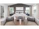 Serene main bedroom featuring a king-size bed, and stylish accent chairs at 1748 Post Oak Dr, Haw River, NC 27258