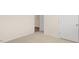 Neutral-toned room with wall-to-wall carpeting, offering a comfortable and adaptable living space at 1749 Post Oak Dr, Haw River, NC 27258