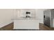 Modern kitchen featuring a kitchen island, stainless steel appliances, and plenty of cabinet space at 1749 Post Oak Dr, Haw River, NC 27258