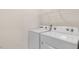 Functional laundry area equipped with a modern washer and dryer for convenient home maintenance at 1749 Post Oak Dr, Haw River, NC 27258