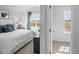 Bedroom with a large window overlooking a green field and a walk-in closet at 1914 Frost Dr, Haw River, NC 27258