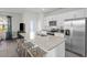 Modern kitchen featuring granite countertops, stainless appliances, and an island with seating at 1914 Frost Dr, Haw River, NC 27258