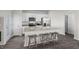 Modern kitchen featuring granite countertops, stainless appliances, and an island with seating at 1914 Frost Dr, Haw River, NC 27258
