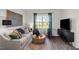 Comfortable living room featuring a neutral color scheme and lots of natural light at 1914 Frost Dr, Haw River, NC 27258