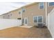 Spacious backyard with patio and white fence, perfect for outdoor enjoyment and privacy at 1916 Frost Dr, Haw River, NC 27258