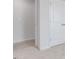 Neutral bedroom featuring plush carpet and a large closet for ample storage space at 1916 Frost Dr, Haw River, NC 27258