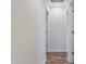 Hallway featuring wood-look floors and access to multiple rooms in the home at 1924 Carr Crk, Sanford, NC 27332