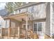 Back porch with ceiling fan, wood-beamed posts, and a wood railing, stairs, and deck at 2623 Broad Oaks Pl, Raleigh, NC 27603